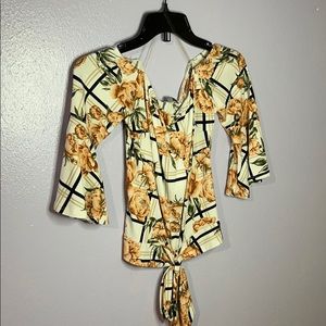 Floral orange off the shoulder shirt !